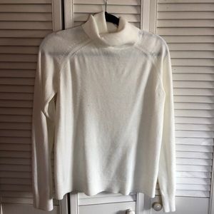 White turtleneck sweater